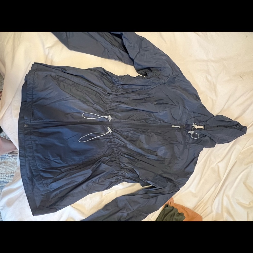 blue windbreaker